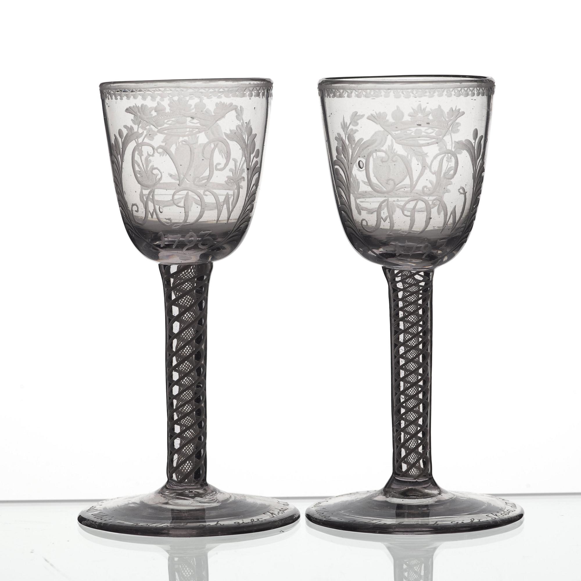 A pair of engraved ale glasses, 18th Century, presumably England.