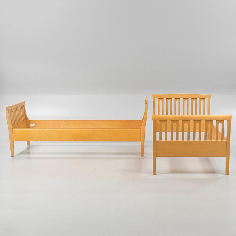 A pair of beds by Carl Malmsten for Åfors Möbelfabrik, second half of the 20th century.