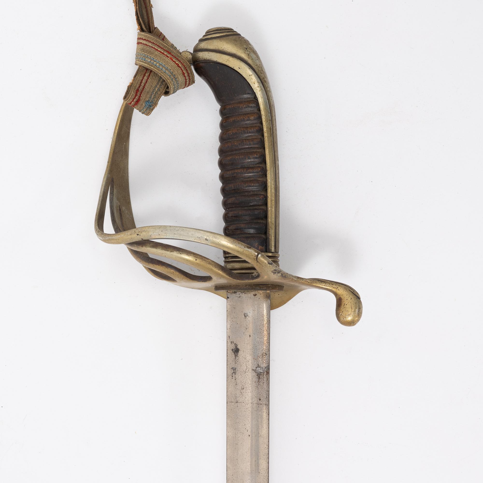A 19th Century sabre with scabbard.