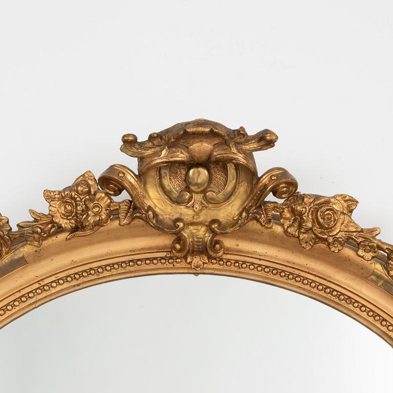 A Rococo Revival mirror, second half of the 19th century.
