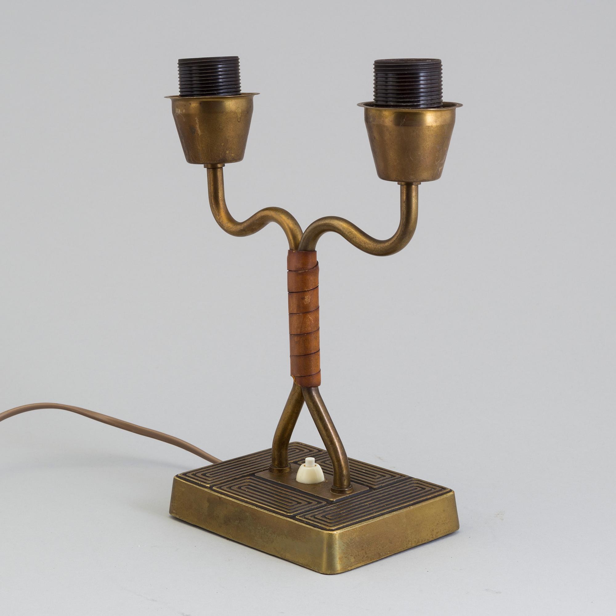 A 1940s Sonja Katzin brass table light from Asea.