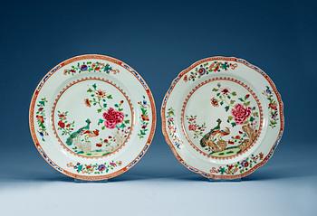 A set of four (2+2) famille rose 'double peacock' dinner plates, Qing dynasty, Qianlong (1736-95).