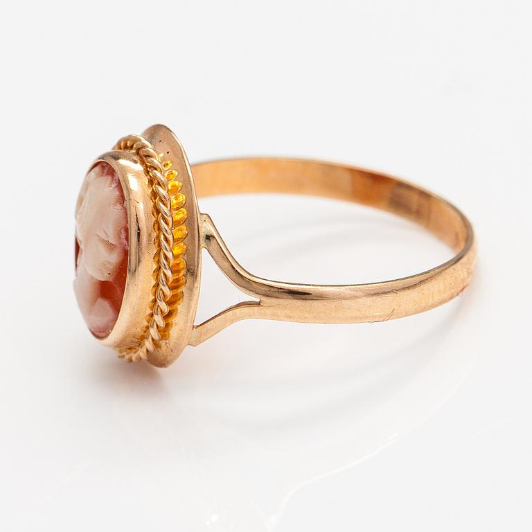 Two brooches and a ring, 14K and 18K gold and sea shell cameos.