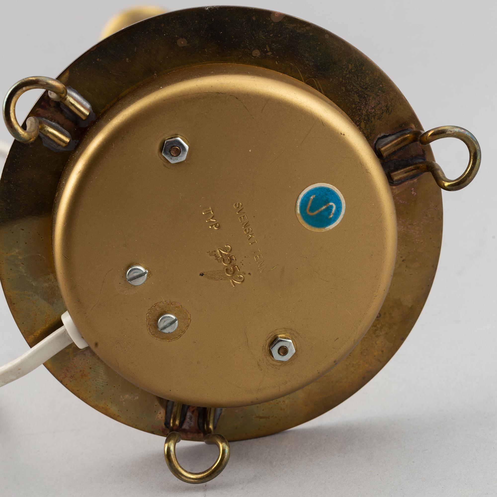 A model 2552 brass table lamp by Josef Frank for Firma Svenskt Tenn.