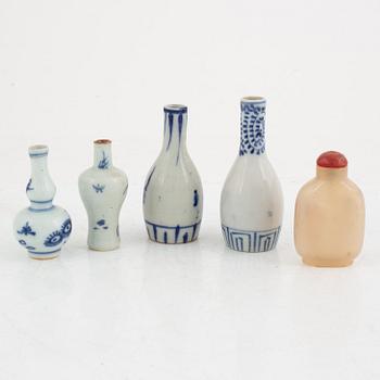 A Chinese stone snuff bottle and four porcelain miniature vases, part 18th century.