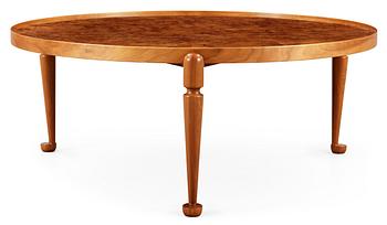 A Josef Frank walnut and burrwood sofa table by Svenskt Tenn, model 2139.