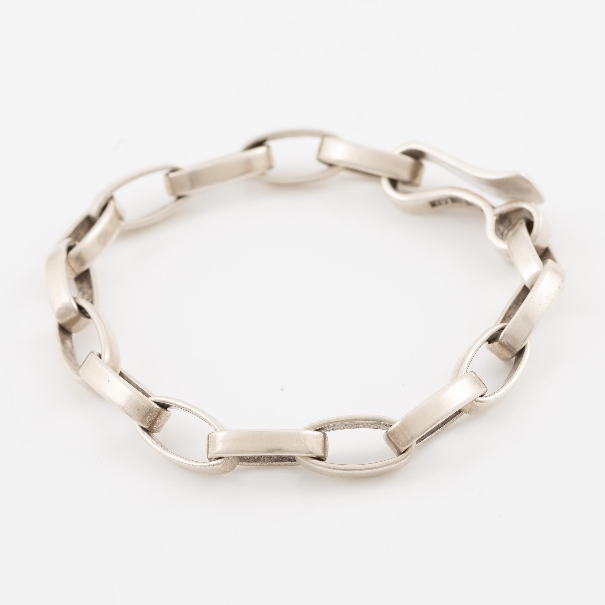 Sven-Erik Högberg samt Annette och Marie Högberg, ring, armband och collier.