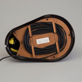 a bakelite and metal table 'Bolide' table lamp, by JUMO, 1940's.