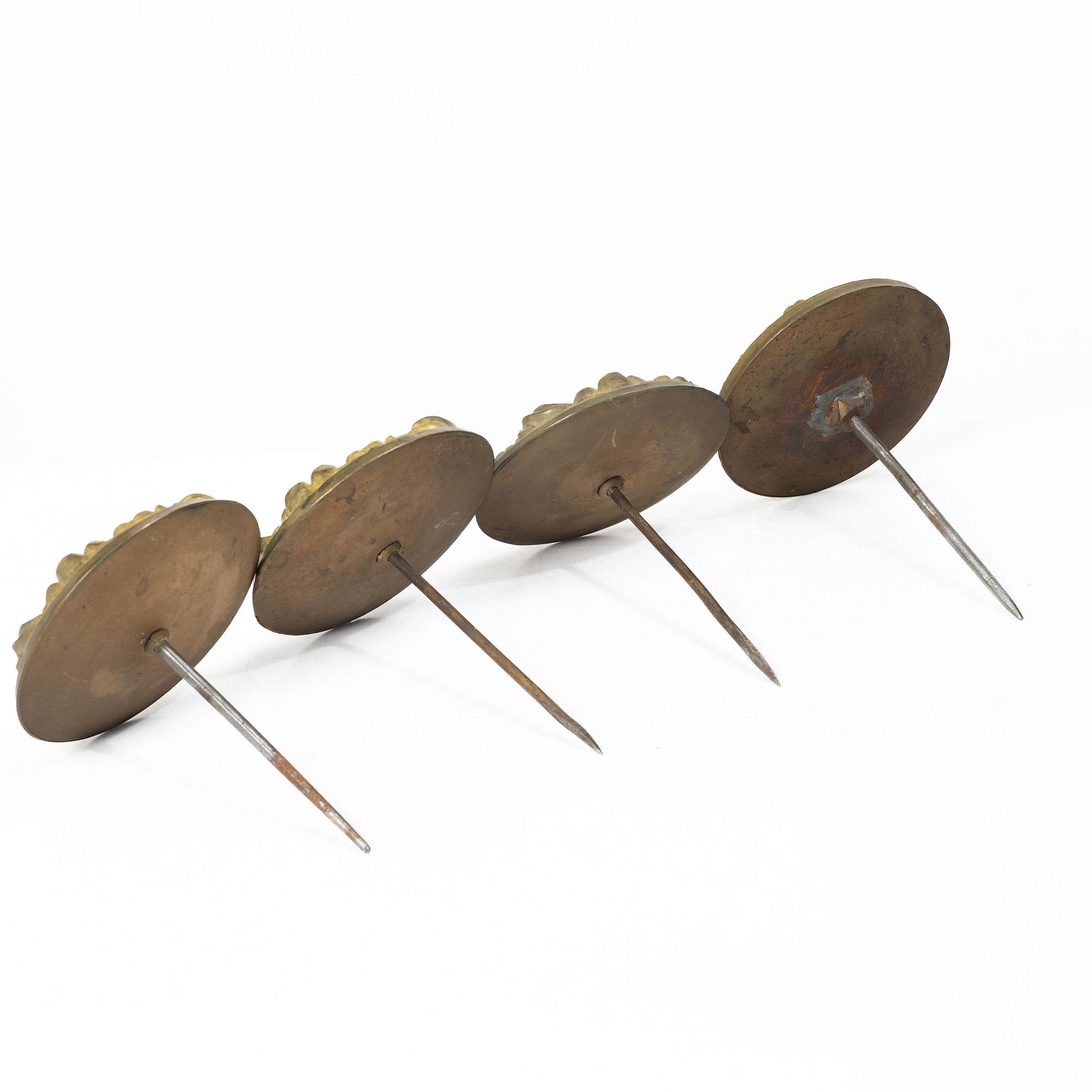 Four Empire curtain tiebacks, early 19th Century.