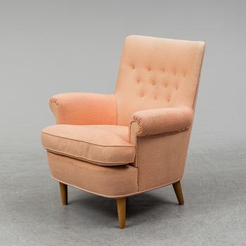 A 'Hemmakväll' easy chair by Carl Malmsten.