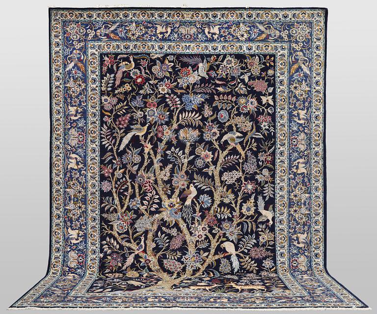 A pictoral Keshan carpet, part silk, signed, c. 393 x 272 cm.