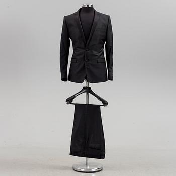 A tuxedo by Dolce & Gabbana, in size 48.