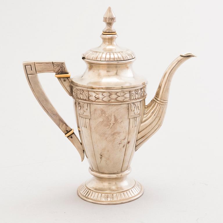 A silver coffee pot, Austria-Hungary 1872-1922, Soviet import mark, Moscow 1927-46.