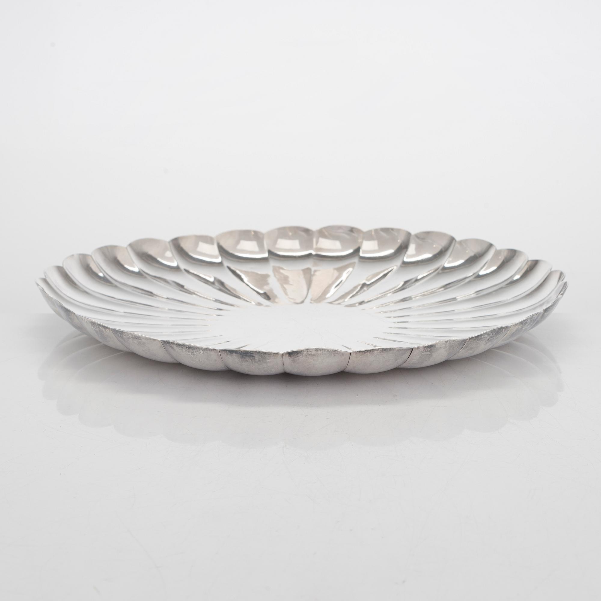 A Japanese chrysanthemum-shaped silver centerpiece dish, mark of late Meiji-period (1868-1912).