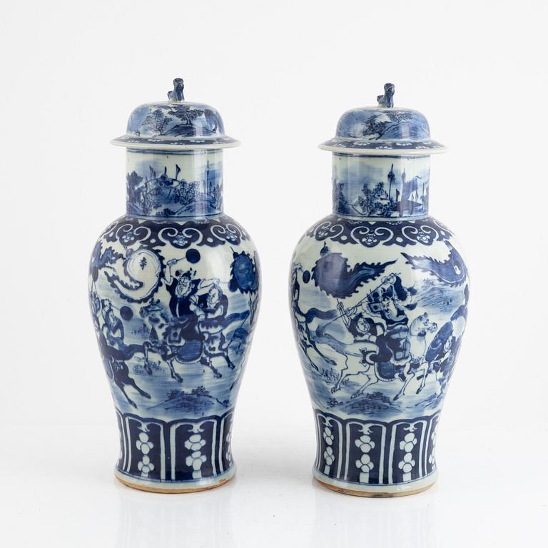 A pair of blue and white urns with covers, China, 19th century.