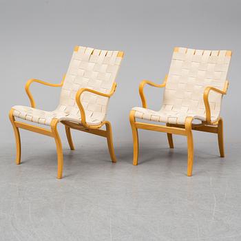 An end of the 20th Century pair of 'Mina' easy chairs  by Bruno Mathsson for Mathssson International.