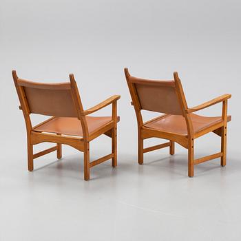 Carl Malmsten, & Yngve Ekström, a pair of easy chairs, model 'Caryngo', Swedese.