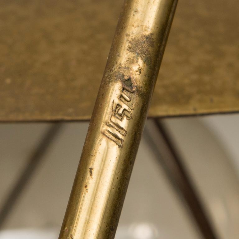 A mid-20th century wall light / table lamp, model EV 57 for Itsu, Finland.