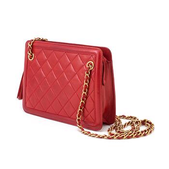 Handbag by Chanel.