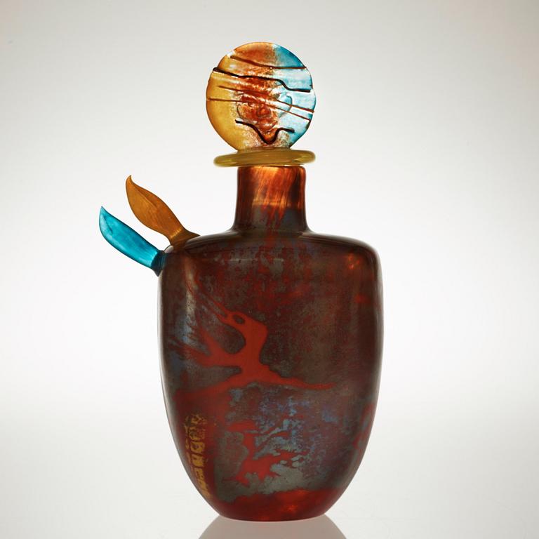 A Kjell Engman cast glass bottle with stopper, Kosta Boda 1991.