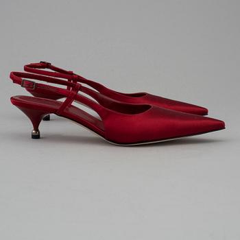 Red silk slingbacks by Sergio Rossi.