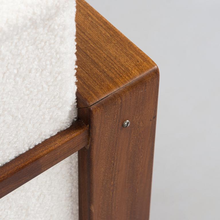 A pair of 1960s armchairs.