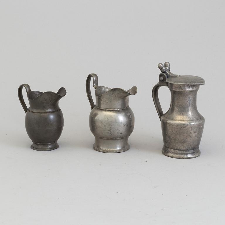 THREE PEWTER JUGS, 18th/19th century.