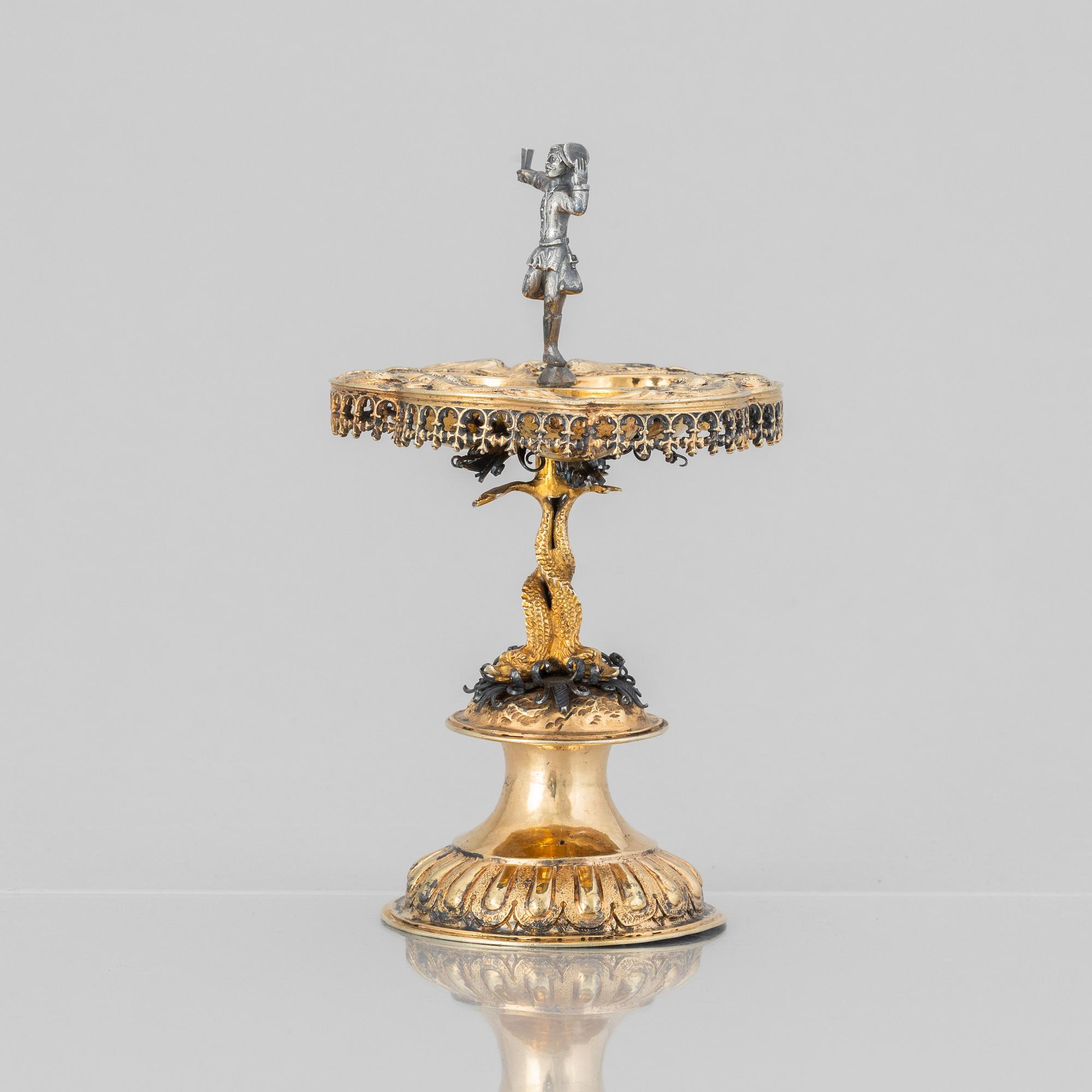 A German parcel-gilt saltcellar/spice rack, makers mark Paulus Braunacker, Nurnberg, probably mid 17th Century.