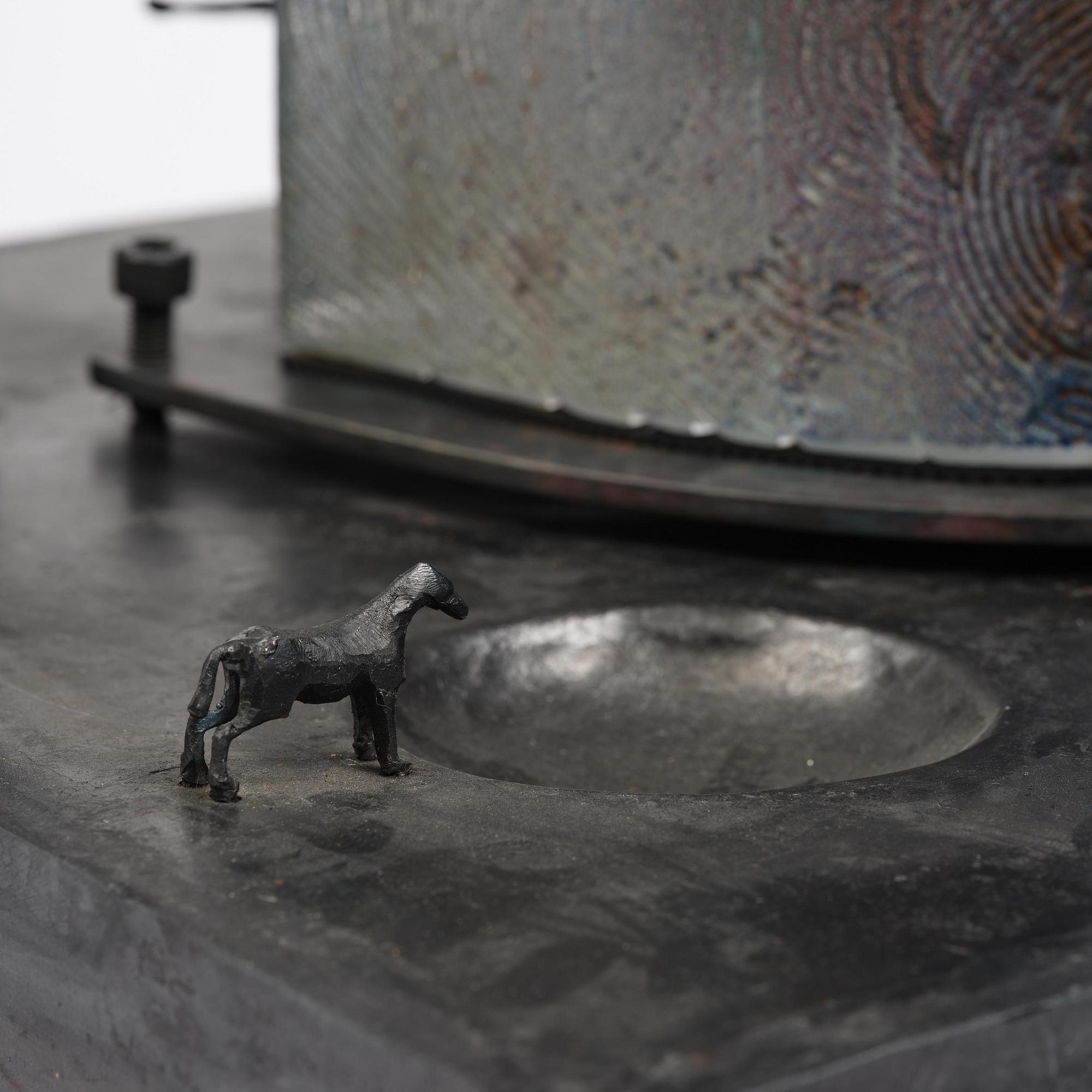 Bertil Vallien, a sand cast glass sculpture of a standing half-boat, Kosta Boda, Sweden.