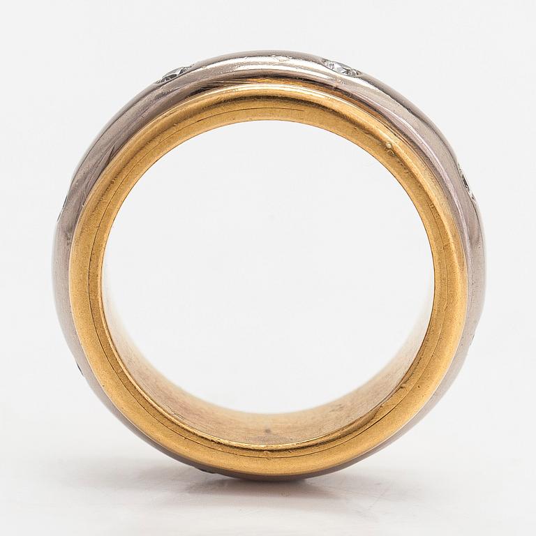 An 18K white/yellow gold ring, diamonds totalling approximately 0.24 ct. Henri Pitkänen, Helsinki.