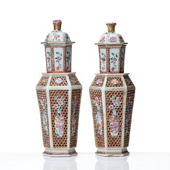 A pair of famille rose vases with covers, Qing dynasty, Qianlong (1736-95).