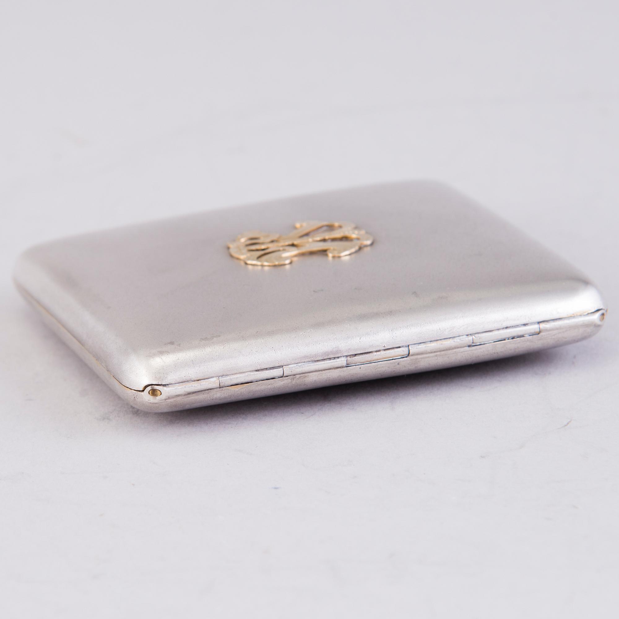 CIGARETTETUI, silver, förgyllt silver, stämplat PP, Helsingfors. Kring 1950.