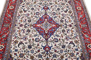 An oriental rug, c. 231 x 143 cm.