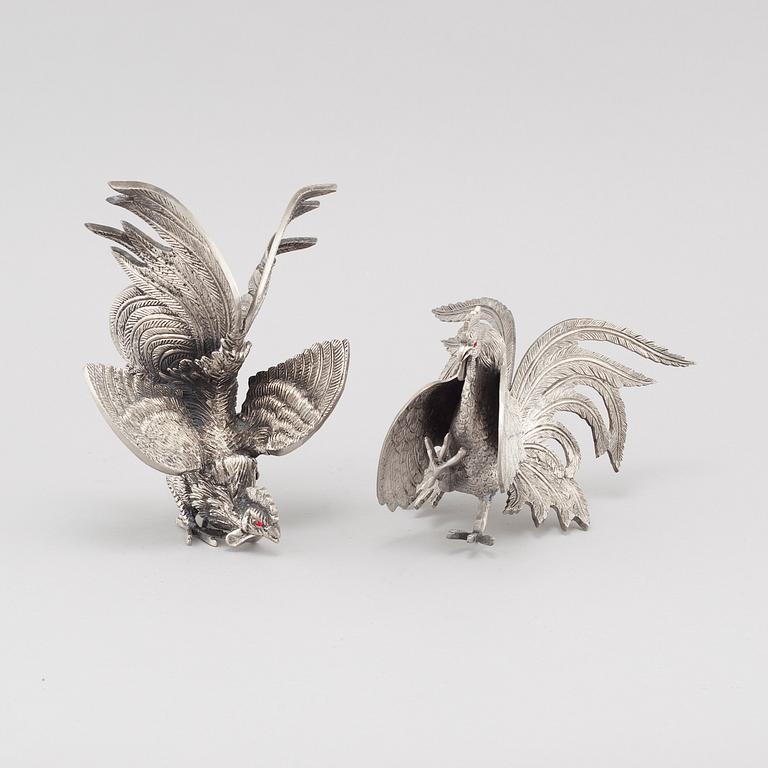 A pair of table decorations in white metal, second half of the 20th century.