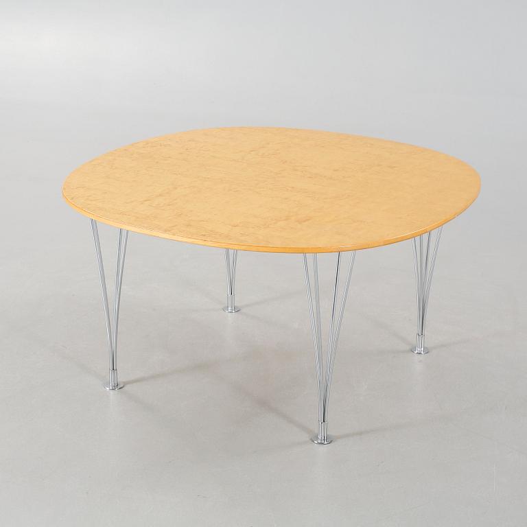 A coffee table named "Supercirkel", designed by Piet Hein and Bruno Mathsson.