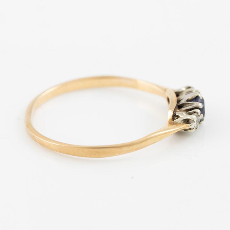 Ring, 18K gold with a small sapphire and octagon-cut diamonds.