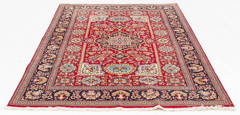 An oriental rug, c. 260 x 162 cm.