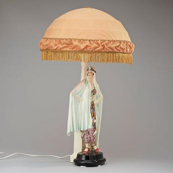 A Josef Lorenzl creamware table lamp, Goldscheider, Vienna 1920's.