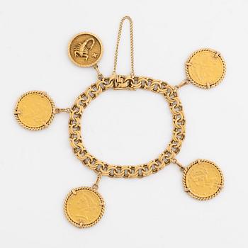 Armband guld bismarcklänk med berlocker med guldmynt.