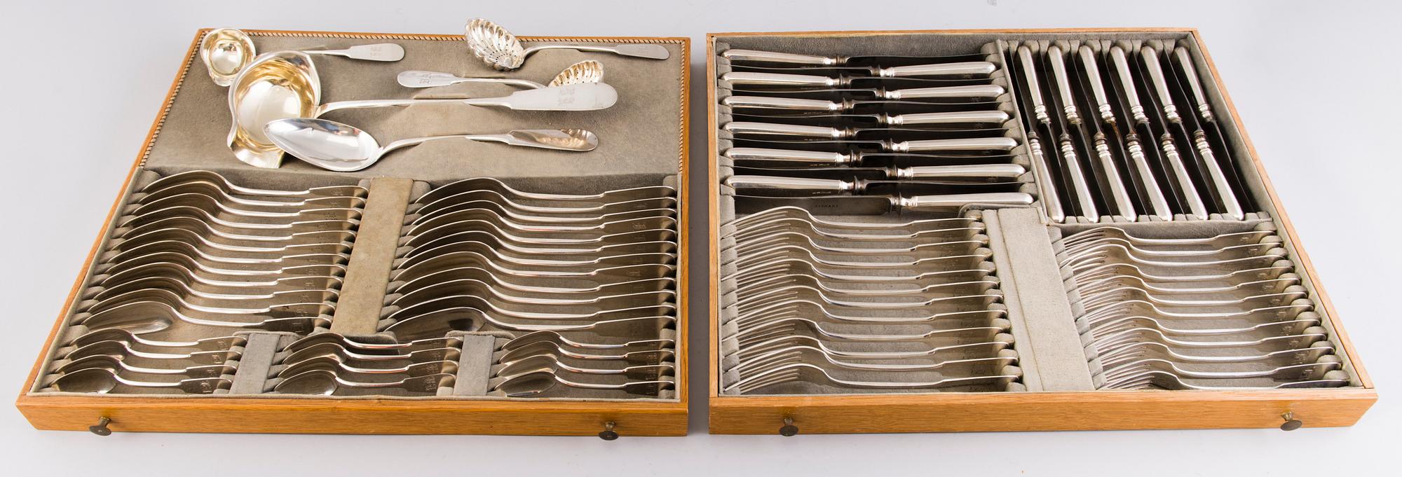A 89-piece set of 'Helsinki' silver cutlery in wooden case, mark of Oskar Lindroos, Helsinki 1917-1925.