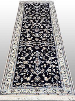 A Nain runner, part silk, approx. 294 x 90 cm.