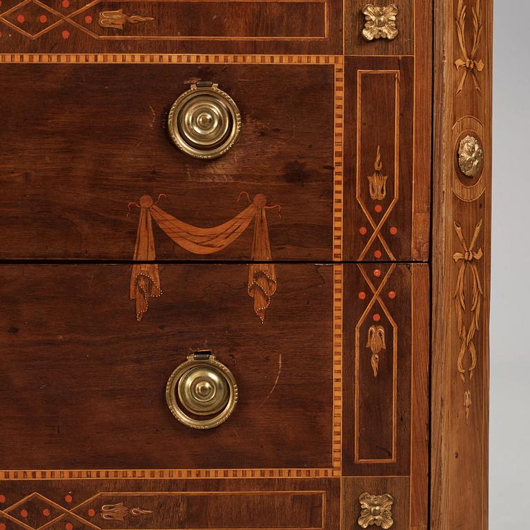 A Gustavian marquetry and ormolu-mounted commode by N. P. Stenström (master in Stockholm 1782 - 90).