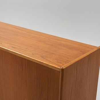 A teak veneered cabinet, 1960s.