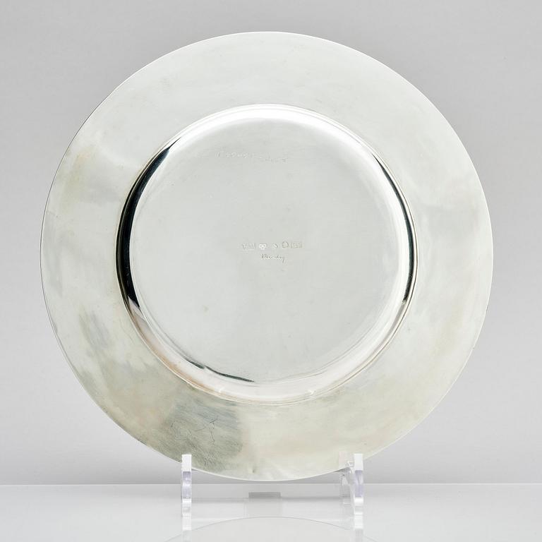 Victor Mossberg, a set of twelve silver plates, Stockholm, 1953-55.