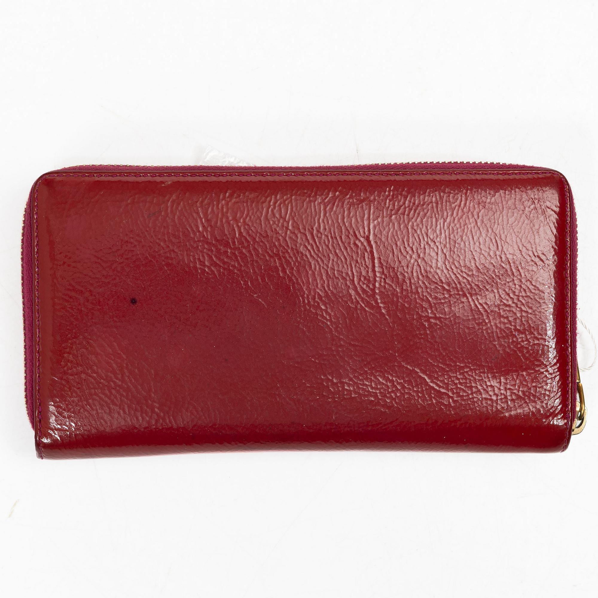 Yves Saint Laurent, a wallet.