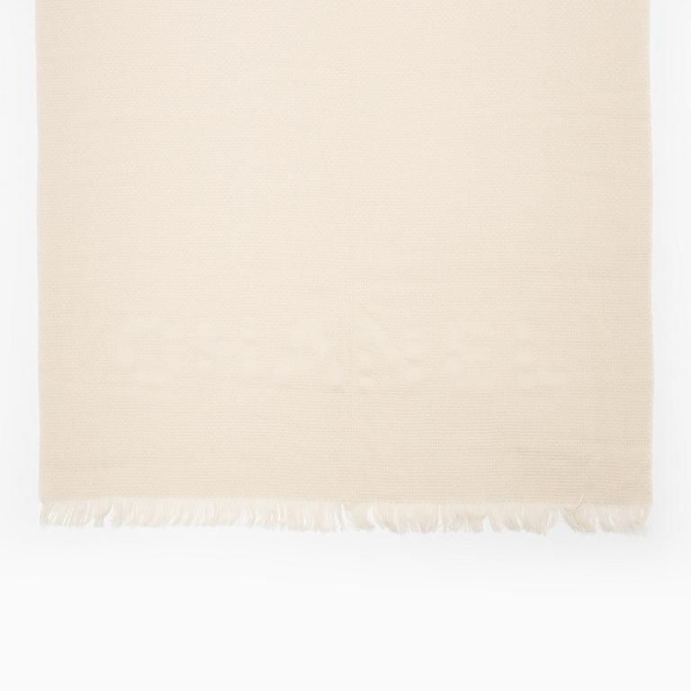 Chanel, a cashmere and silk-mix shawl.