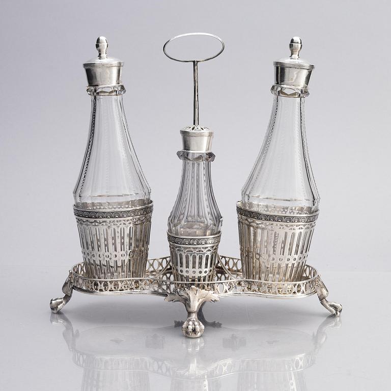 A Swedish 18/19th century silver and glass cruet-set, mark of Pehr Zethelius and Paul Wihlborg, Stockholm 1795 and 1814.