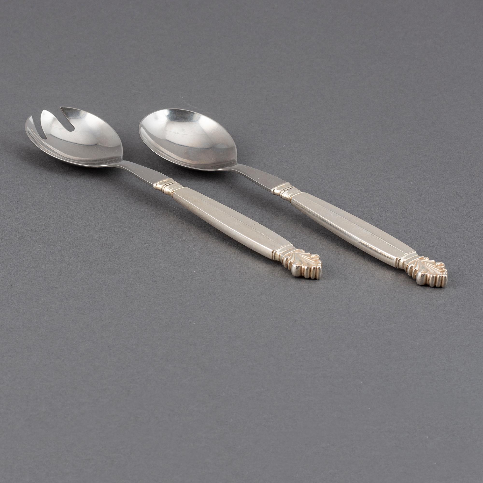 JOHAN ROHDE, a pair of "Dronning/Acanthus" silver sallad cutlery, Georg Jensen, Denmark.