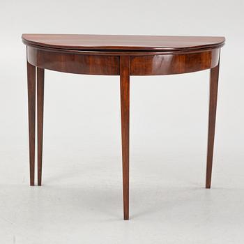 A late Gustavian mahogany veneered games table, around 1800.