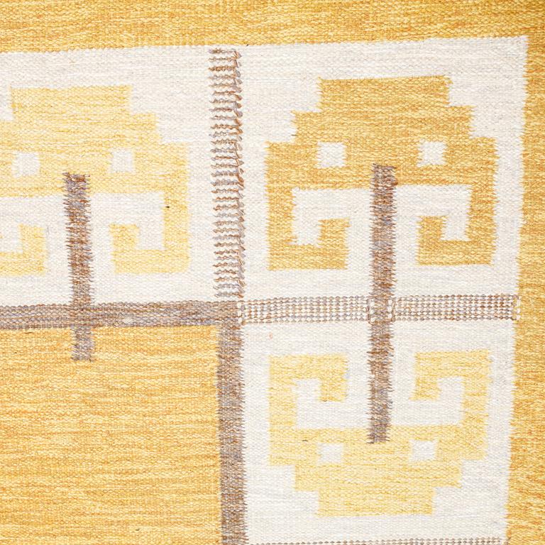 A flat weave, signed W, around the mid 20th century, ca 243 x 172 cm.